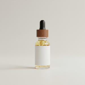 Professional e-commerce product photography of a **brandless** Beard Oil Citrus Blend (Nourish and soften facial hair with a bright citrus lift.). The entire environment is a perfectly uniform, flat, solid color #EAE9E7 (light warm gray) with absolutely no gradient, vignette, spotlighting, texture, noise, or grain. The object is centered and tiny, occupying only 25% of the frame, surrounded by massive negative space. The background and floor are a seamless, infinite cyclorama of solid color #EAE9E7 with no horizon line, no corner, and no visible wall/floor transition. Lighting: ultra-even high-key with very strong global illumination and soft, multi-directional bounced fill (studio light tent look). Bright exposure (lifted midtones and shadows, low contrast), slightly overexposed overall while preserving product detail. Fully diffuse, no hard shadows, no cast shadows; at most a barely visible neutral contact shadow. No harsh specular highlights. Framing: simple 3/4 view. Perfectly centered. Style: ultra-clean, minimalistic. No logos, no text, no distractions. 8k resolution, sharp details on the object.